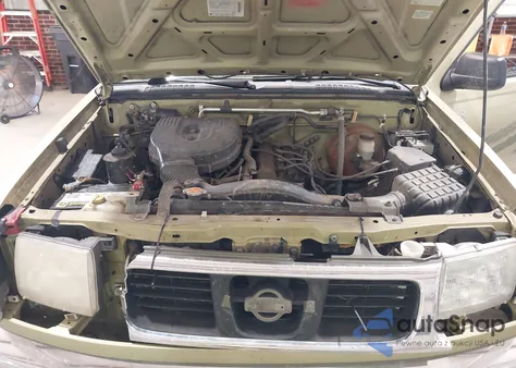 1998 Nissan Frontier Xe z USA, uszkodzony, nr VIN 1N6DD21Y6WC338111